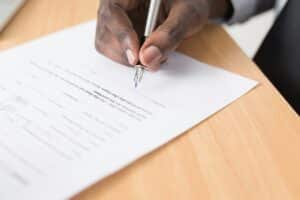 A person signing a contract